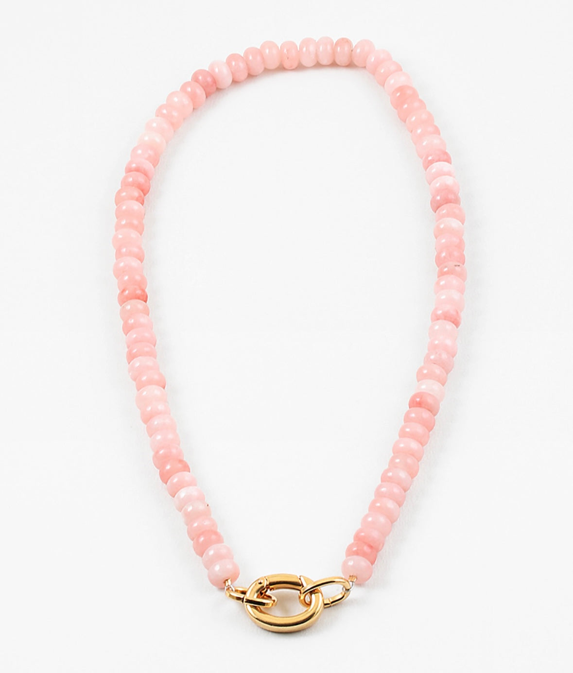 Light pink bead necklace with large gold carabiner clasp.