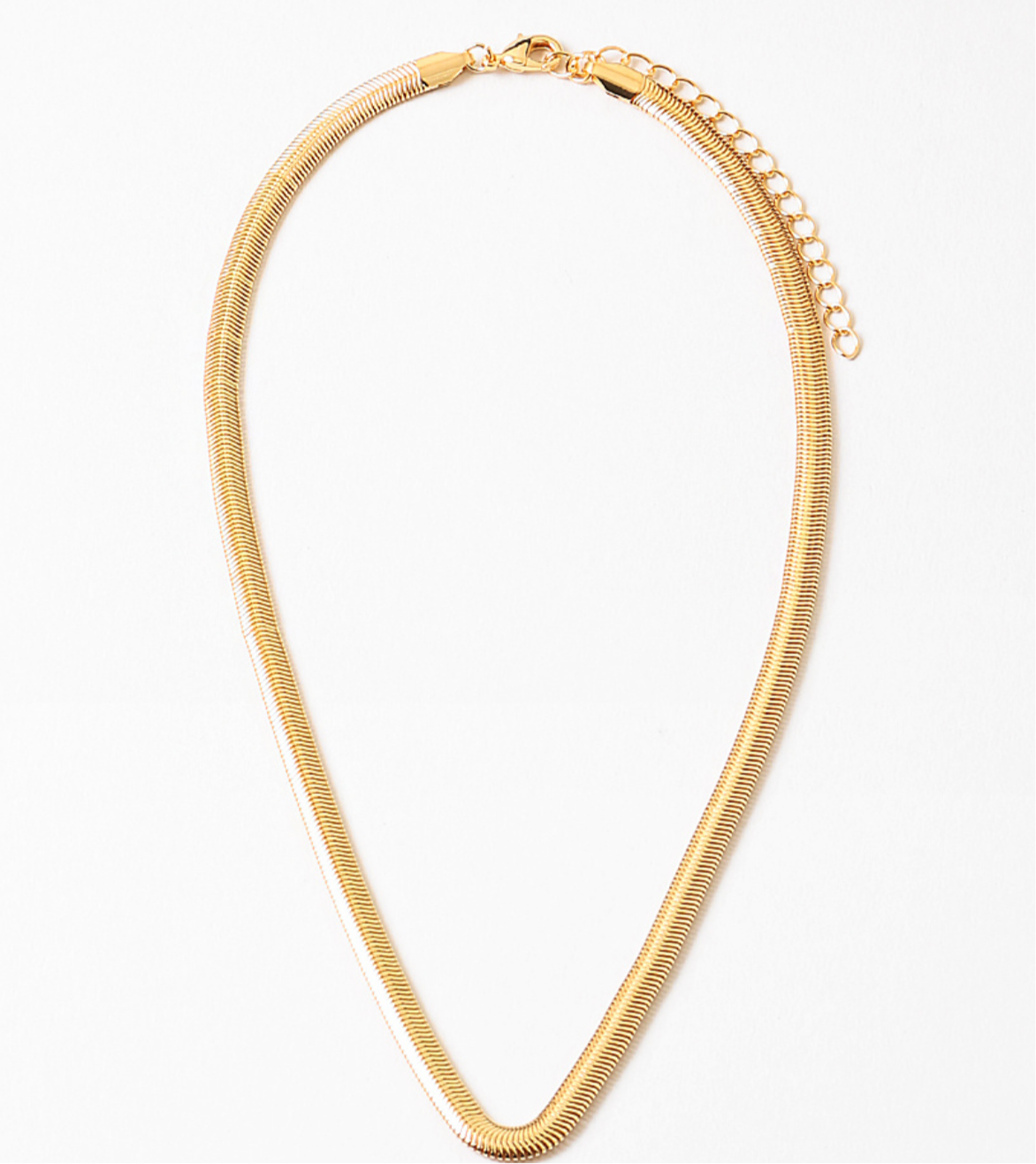 Gold chain necklace on a white background