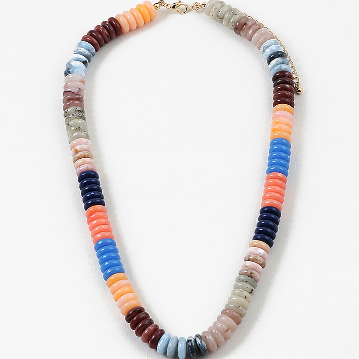 Multicolored beaded necklace on a white background