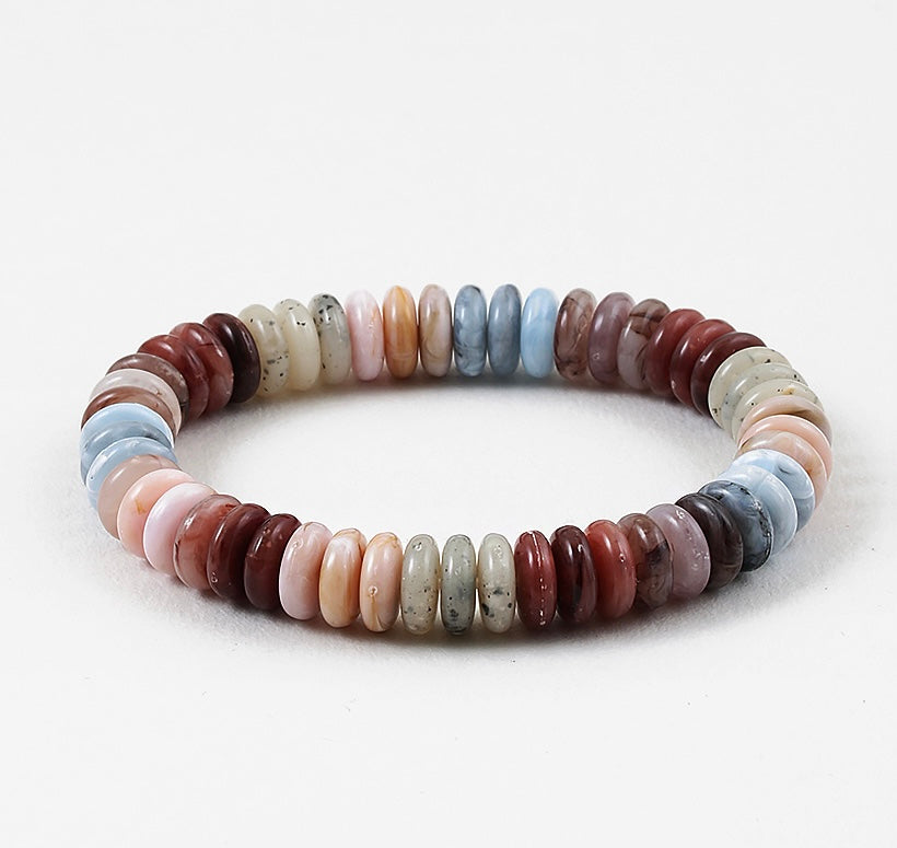 Multicolored beaded bracelet on a white background
