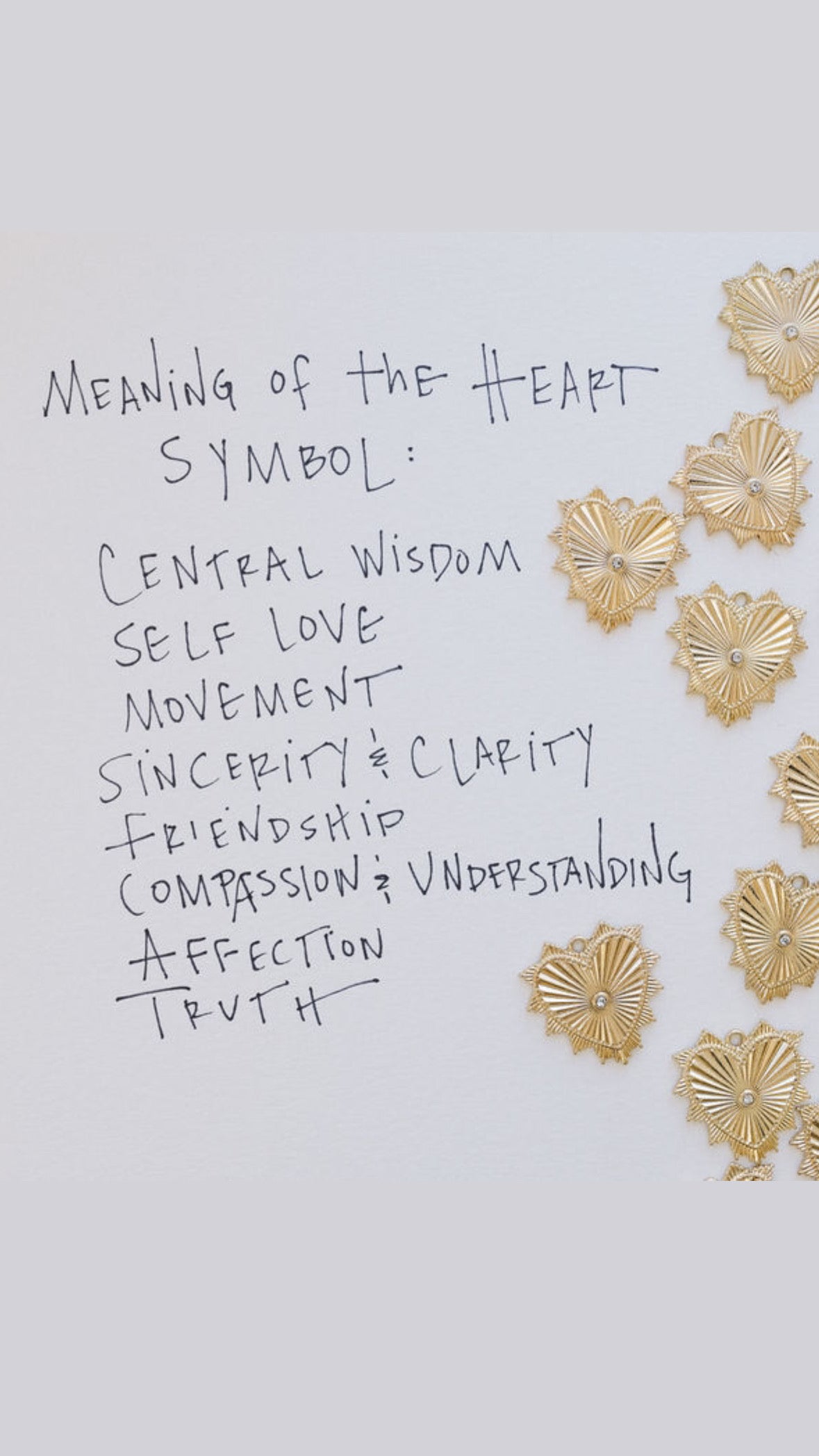 Picture of words and 8 textured heart pendants. Words read: Meaning of the Heart Symbol: Central Wisdom, Self Love, Movement, Sincerity & Clarity, Friendship, Compassion & Understanding, Affection, Truth.