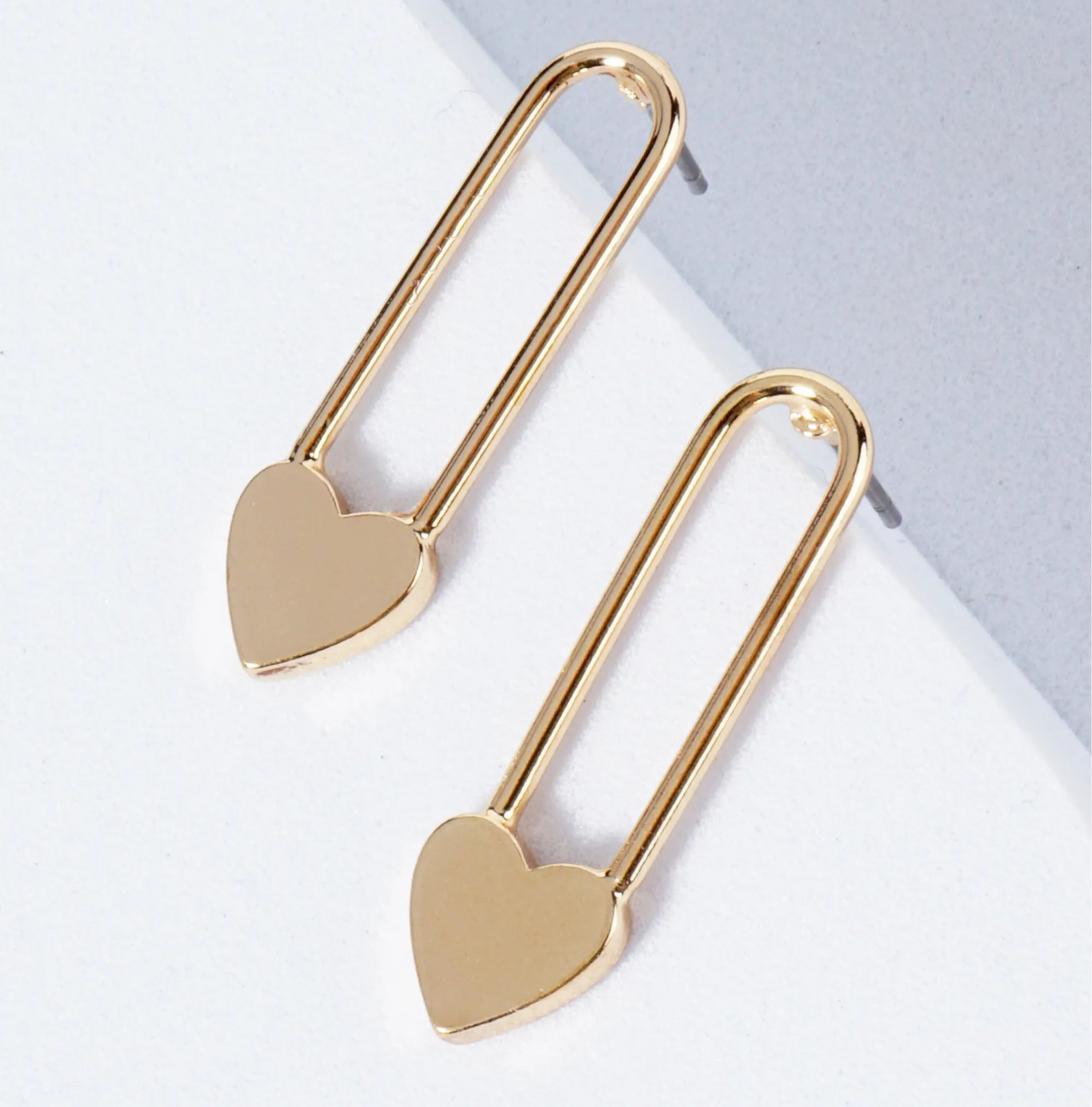 Gold Paperclip Earrings with a heart.