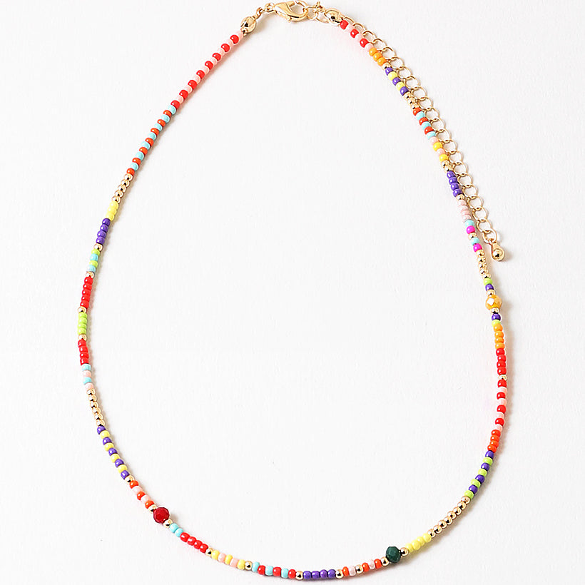 Colorful beaded necklace on a white background