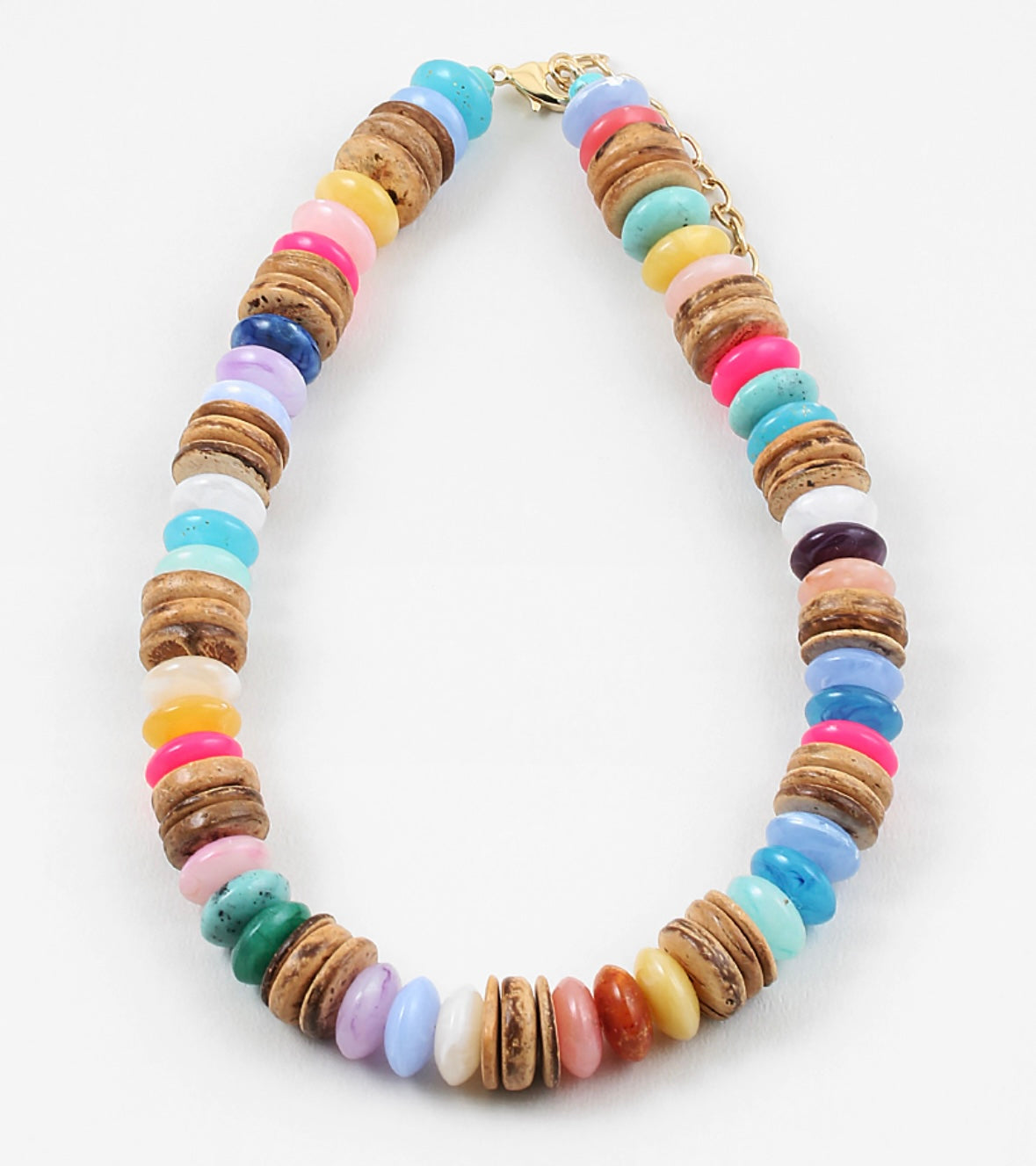 A chunky multicolor bead necklace with coconut disc spacer beads.