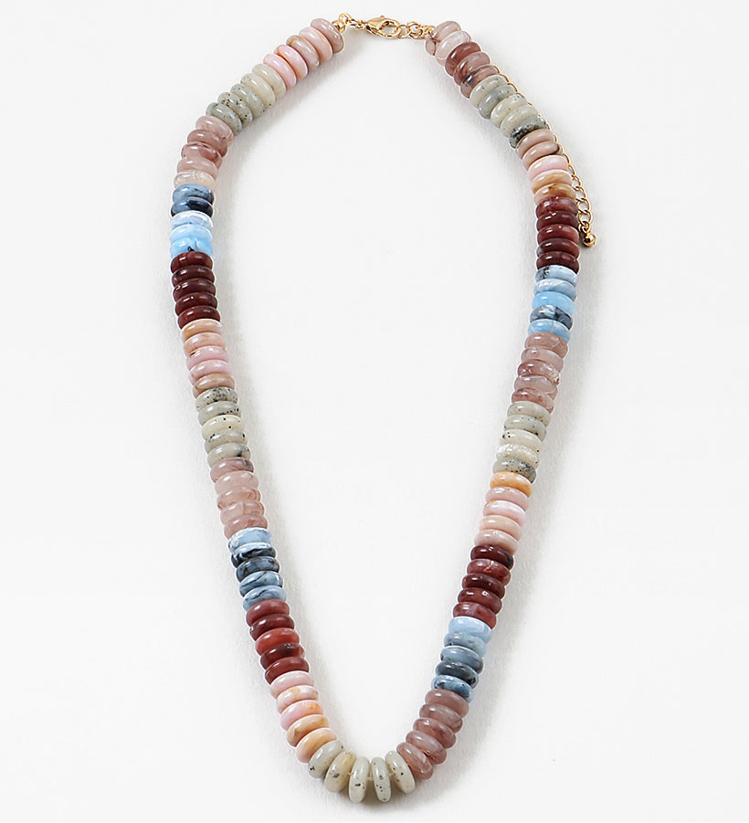Necklace with multicolored beads on a white background