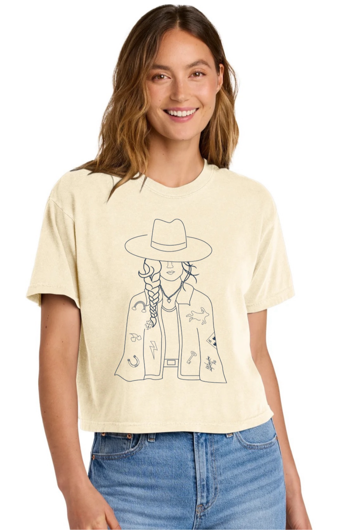 Woman wearing a light-colored t-shirt with a graphic design on a white background