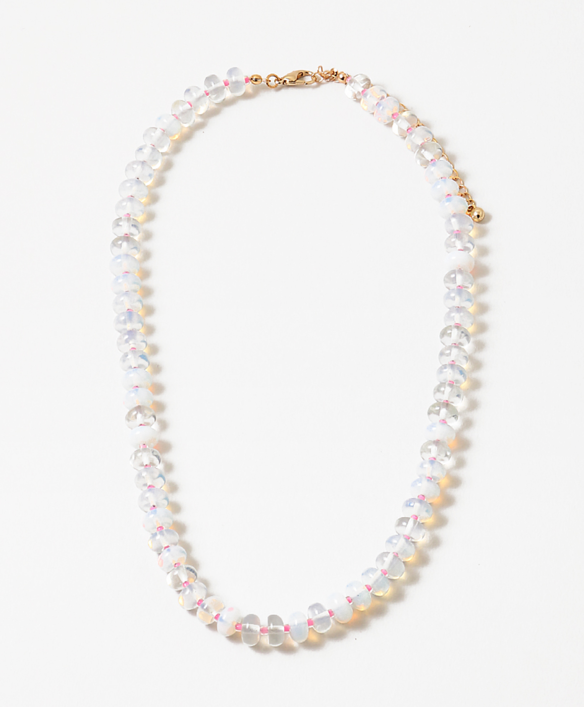 Resin bead necklace with clear and opaque stones.