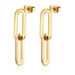 Gold chain-style earrings on a white background