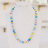 Beautiful multi-colored beaded necklace of blue, white, pink and yellow.