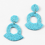Turquoise beaded earrings on a white background