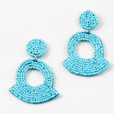 Turquoise beaded earrings on a white background