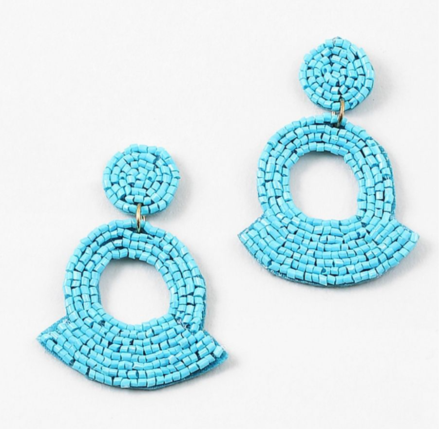 Turquoise beaded earrings on a white background