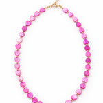 Necklace with pink heart-shaped beads on a white background