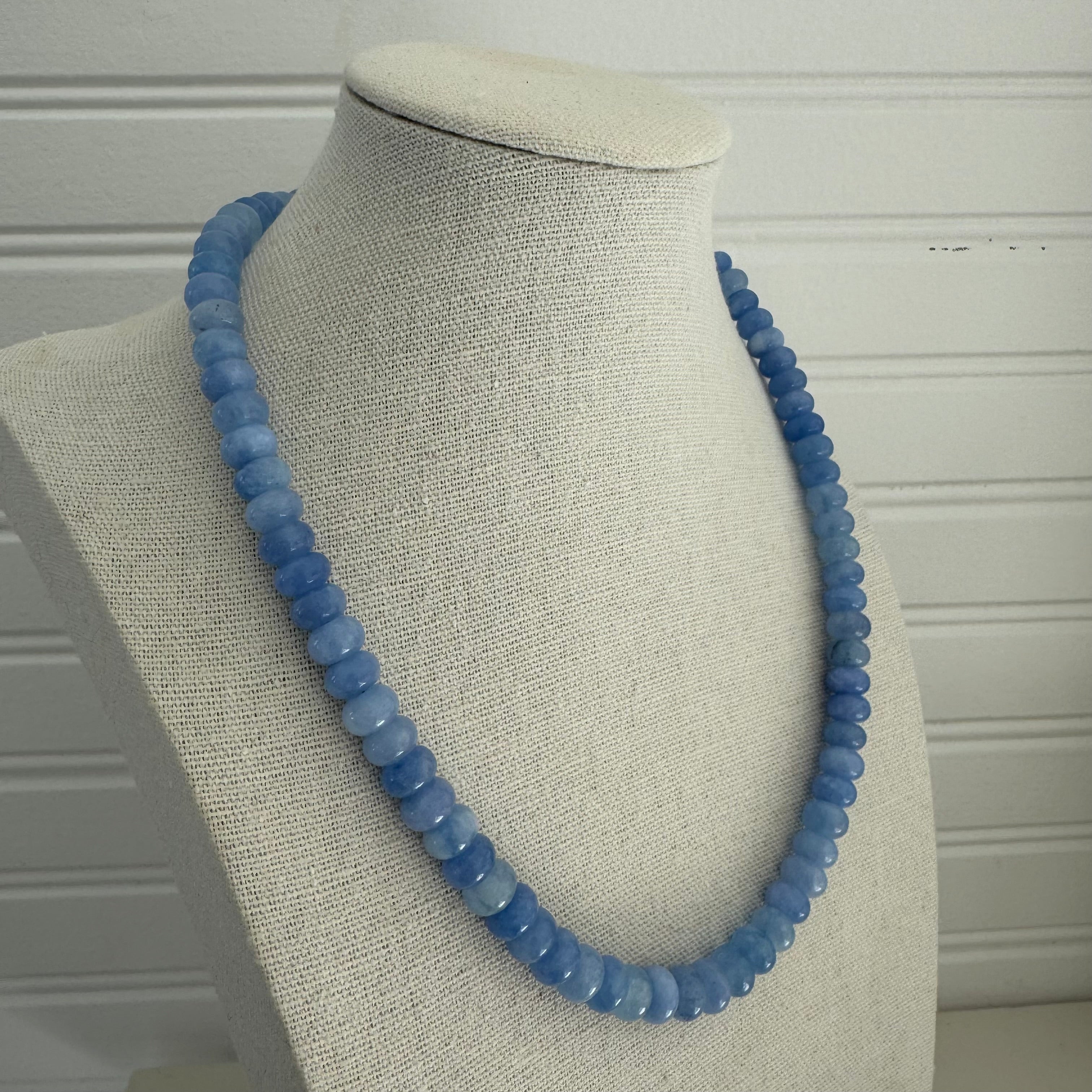 Necklace made up of periwinkle blue beads.