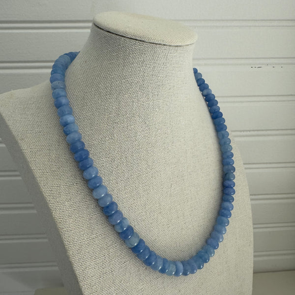 Necklace made up of periwinkle blue beads.