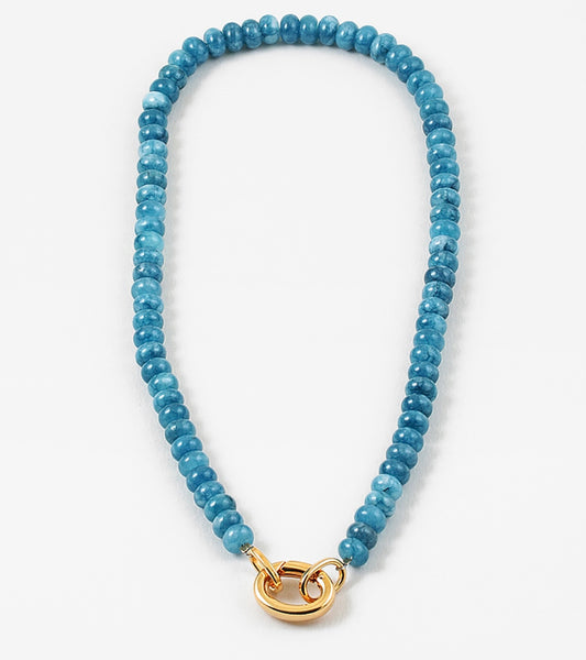 A marbled blue bead necklace with a gold carabiner clasp.