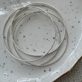 Five Silver Bangles