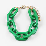 Green chain-link bracelet on a white background