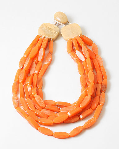 Picture of an orange flat oval bead bracelet made of 6 strands with a natural wood clasp.