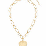 Gold chain necklace with a heart-shaped pendant on a white background