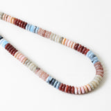 Necklace with multicolored beads on a white background