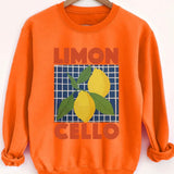 Orange sweatshirt with 'Limon Cello' and lemons design on a hanger