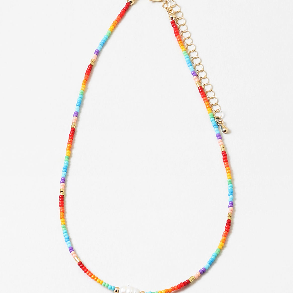 Necklace with colorful rainbow beads and a gold chain on a white background