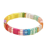 Picture of a rainbow bead bracelet in yellows, reds, greens, oranges and blues.