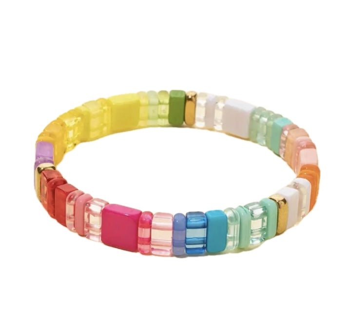 Picture of a rainbow bead bracelet in yellows, reds, greens, oranges and blues.