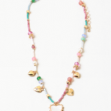 A colorful necklace with a mix of heart-shaped charms and dreamy pink and turquoise colors, displayed against a plain background.