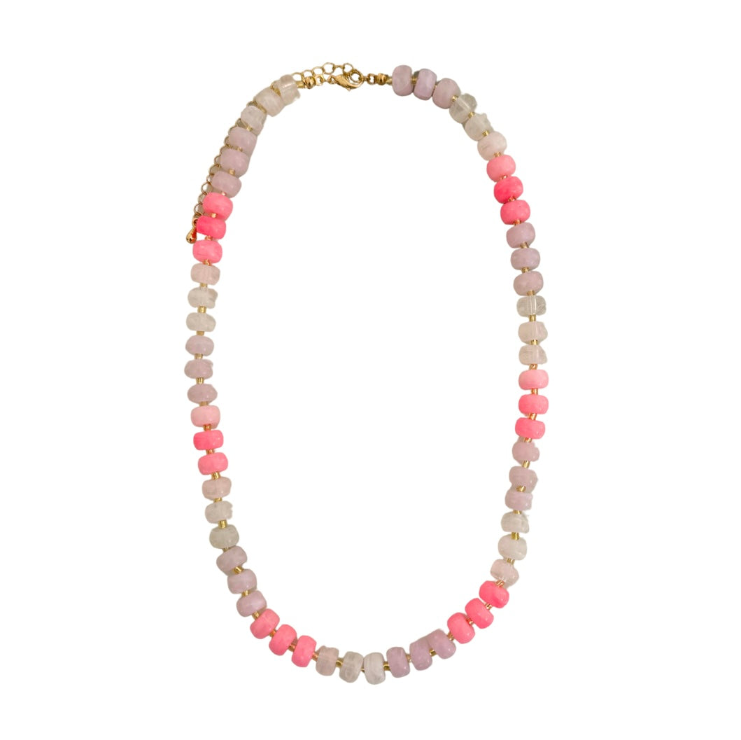Necklace with pink and beige beads on a white background