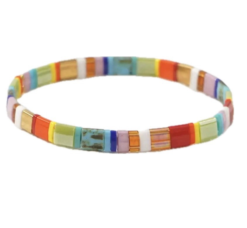 Multicolored rectangle beaded bracelet on a white background
