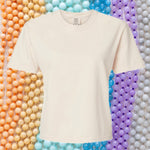An image of a cream t-shirt with a rainbow colored beaded  background