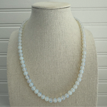 Picture of an opaque white bead necklace