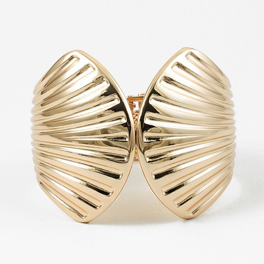 Gold shell-shaped cuff bracelets on a white background