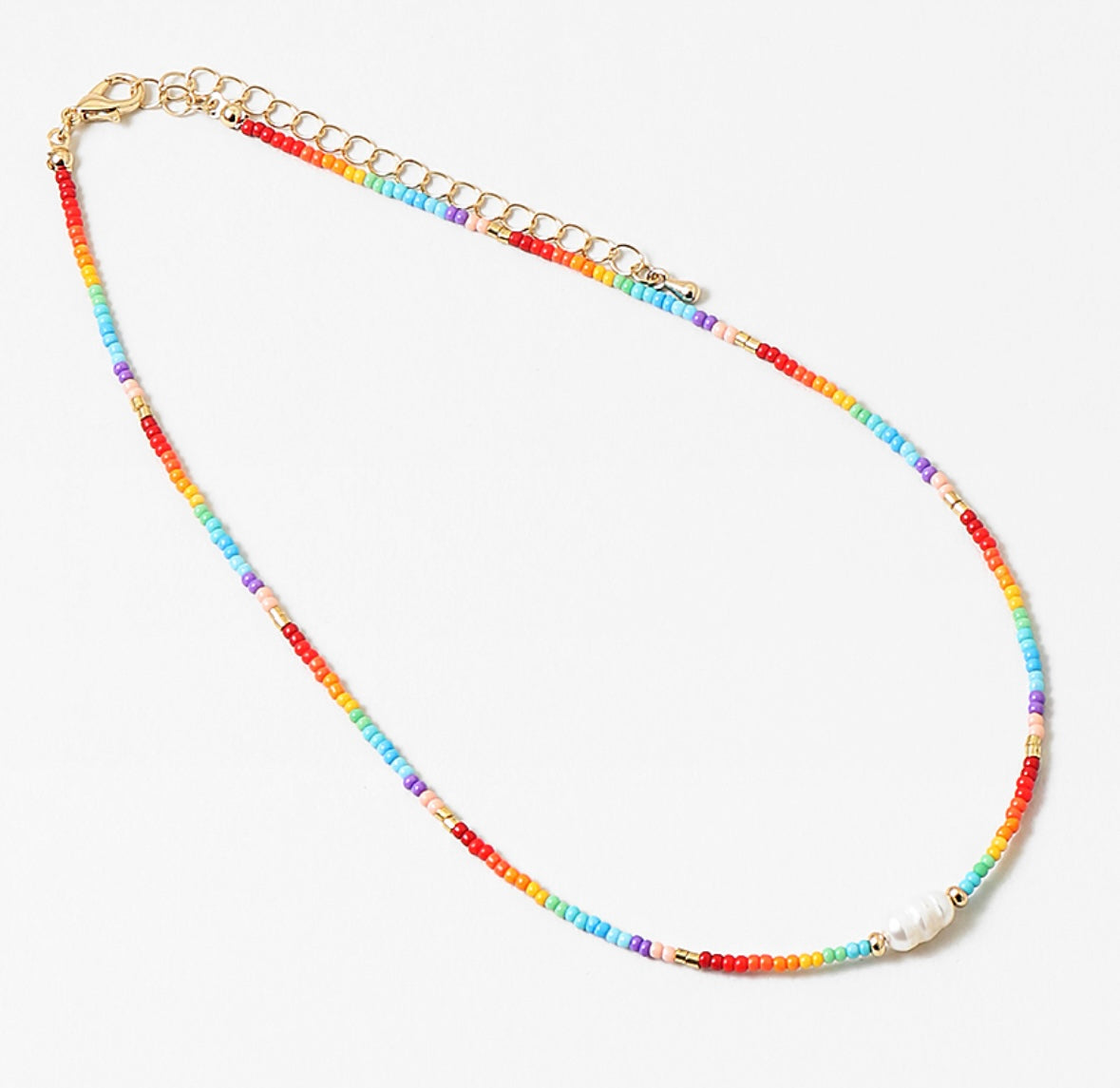 Multicolored rainbow beaded necklace with a gold chain on a white background