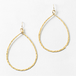 Gold tear drop dangle hoop earrings on a white background
