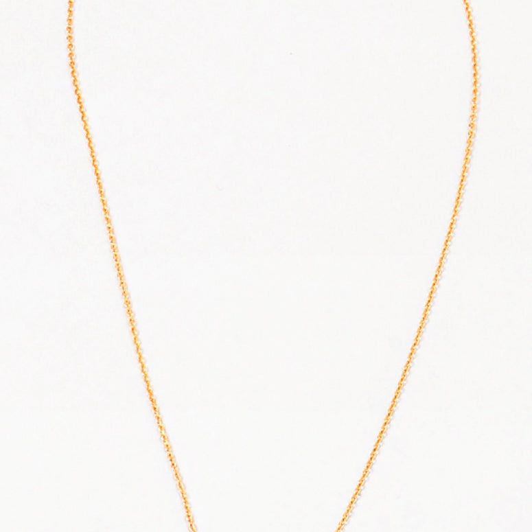 A gold-colored necklace with two interlocking circles as the central pendant on a white background.