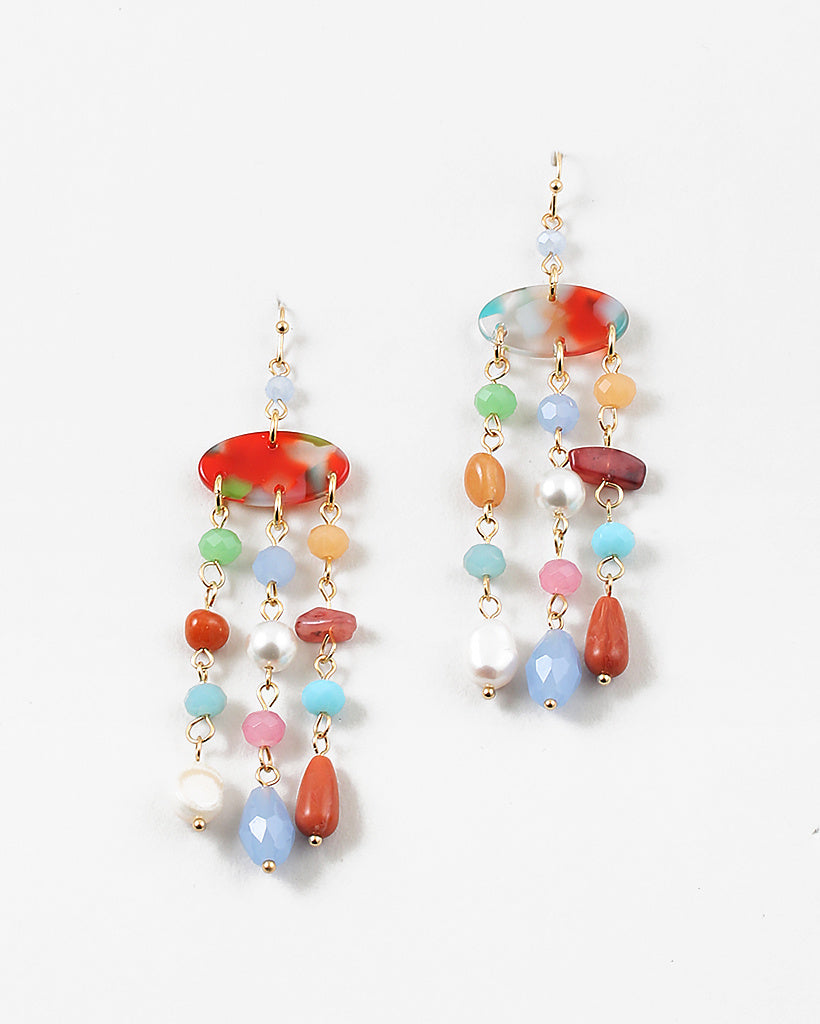 Set of dangle earrings with three strands of small beads hanging from each oval base. Earrings are shades of red, blues, greens and fresh water pearls.