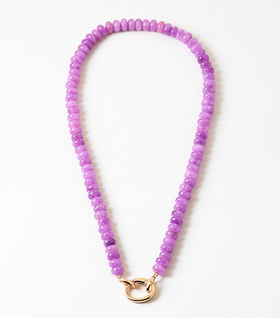 Purple beaded necklace with a gold clasp on a white background