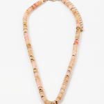 Picture of peach colored bead necklace with gold spacers beads interspersed through out.