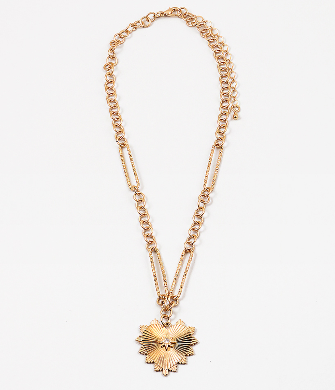 Gold chain necklace with a gold textured heart medallion