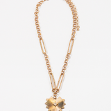 Gold chain necklace with a gold textured heart medallion