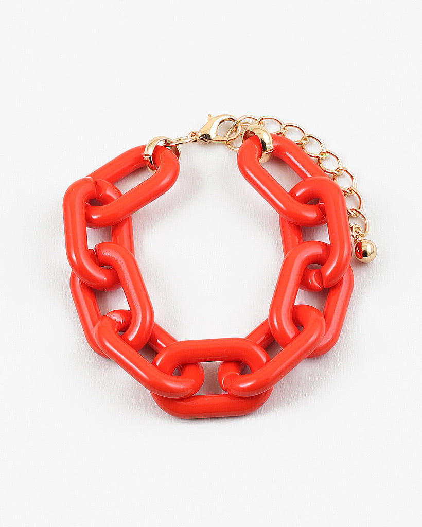 Red chain-link bracelet on a white background