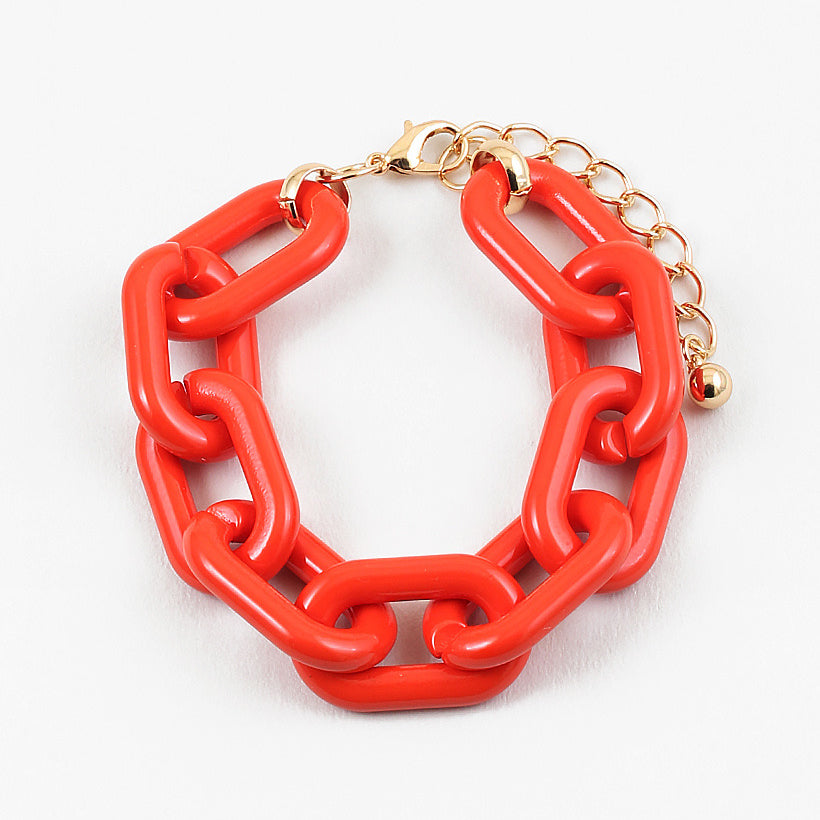 Red chain-link bracelet on a white background