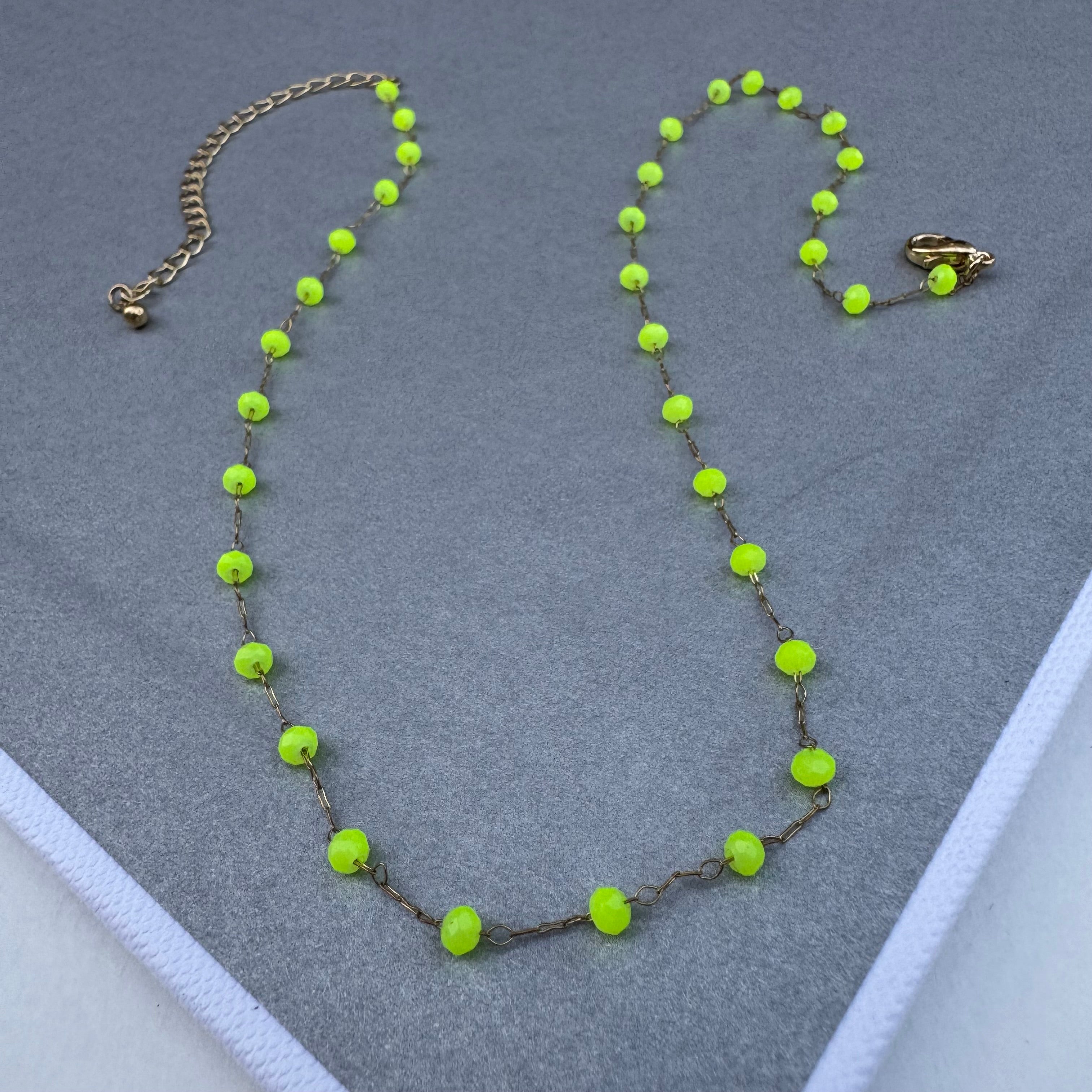 Simple chain with bright yellow beads.