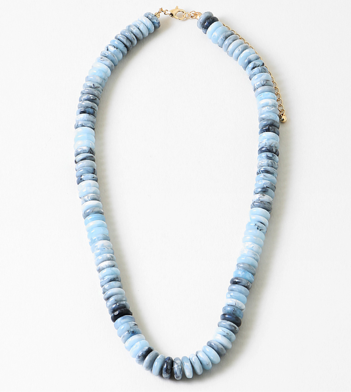 Necklace with blue and gray beads on a white background