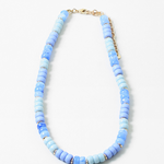 An image of a blue beaded short necklace/choker with little gold beads