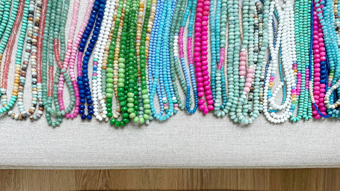 Many strands of an assortment of colorful beads