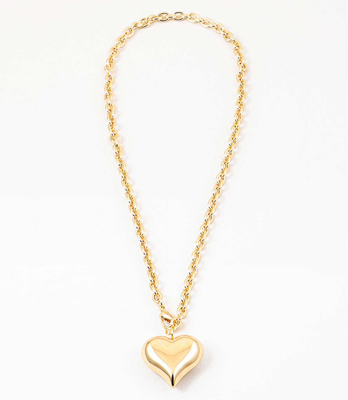 Twisted gold chain with large gold bubble heart pendant.